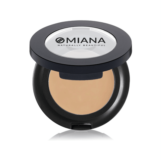 Compact powder vegan mineral brow cream in a black case with Omiana branding on a white background